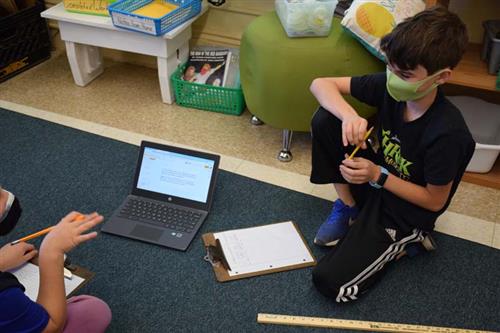 Students Working Together In The Classroom